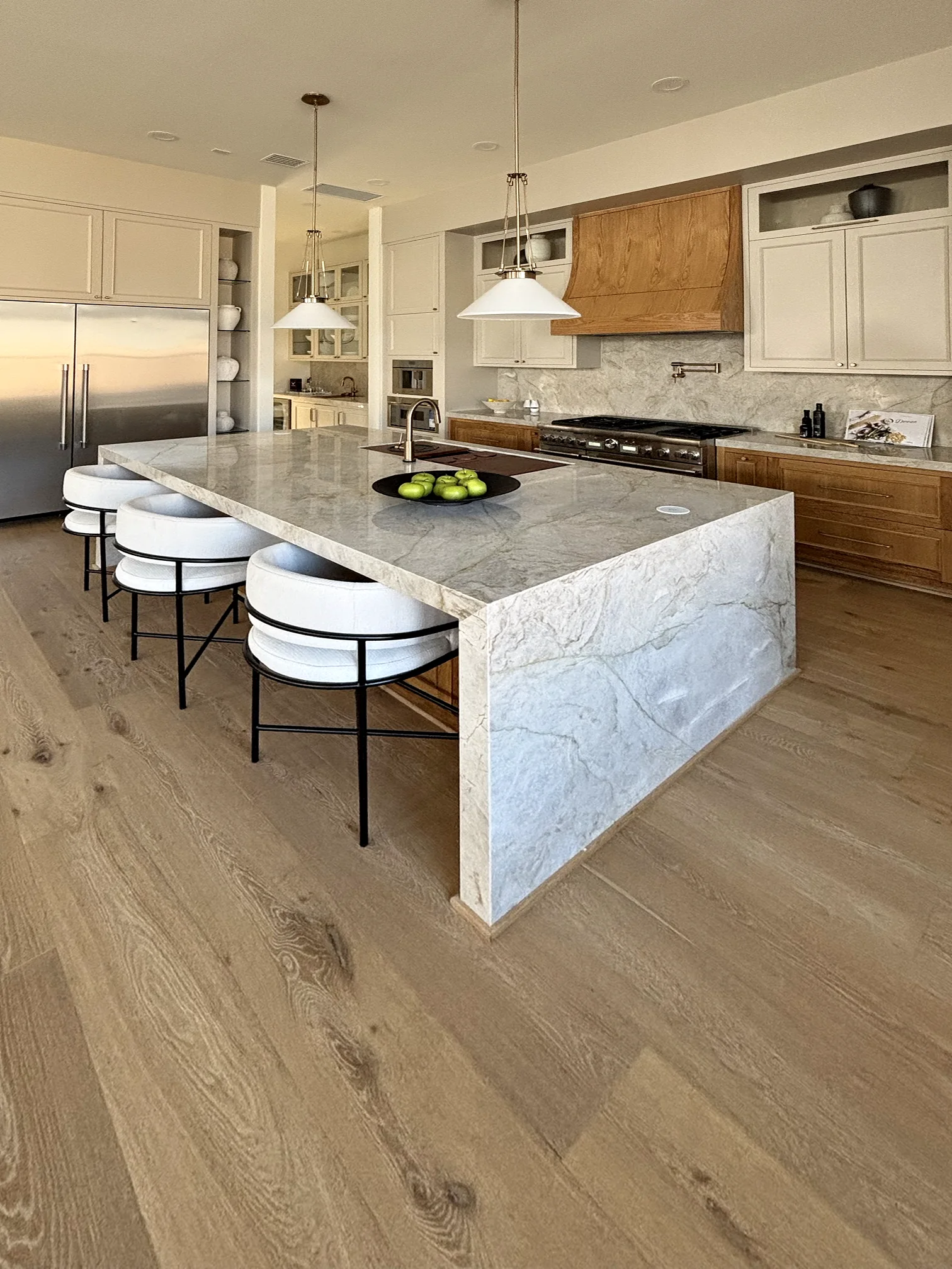 Kitchen island with cone-shaped pendant lights